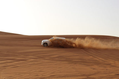 Dubai: Sunrise Desert Safari with Dune Bashing, Camel Ride and Sandboarding