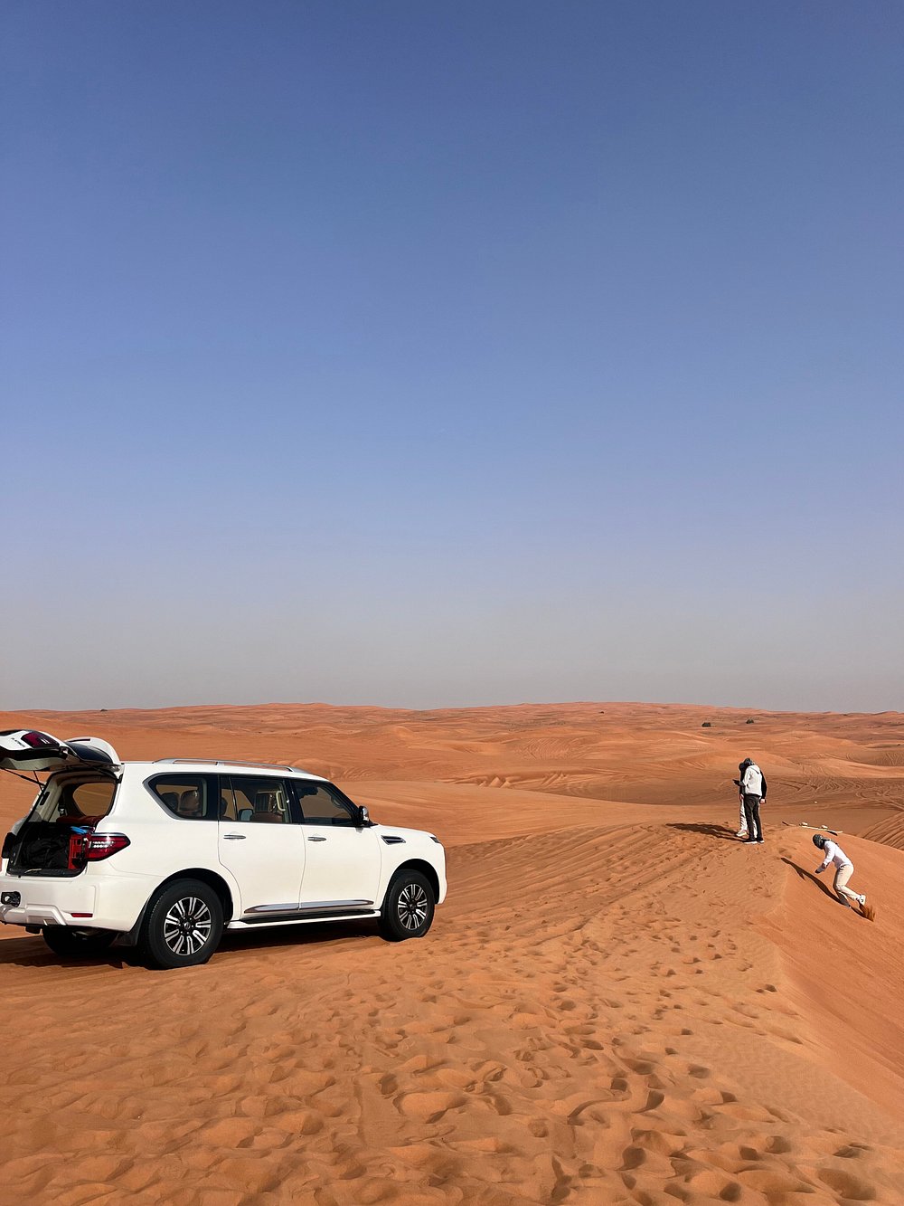 Dubai: Sunrise Desert Safari with Dune Bashing, Camel Ride and Sandboarding