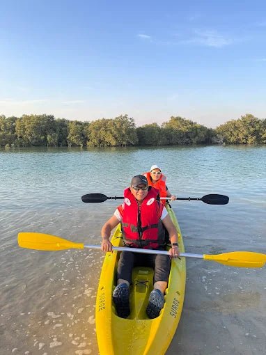 From Doha: Al Thakira Mangroves Kayaking and Purple Island Tour