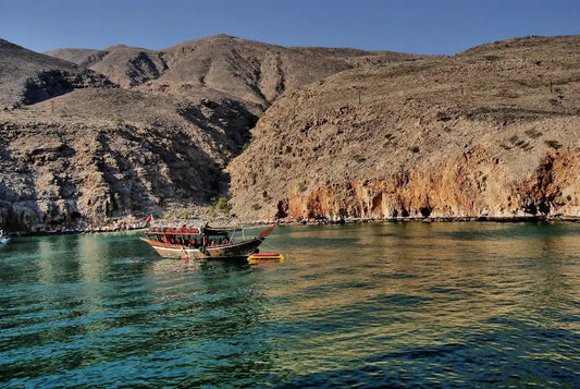 From Khasab: Overnight Dhow Cruise with Dolphin Watching and Snorkeling