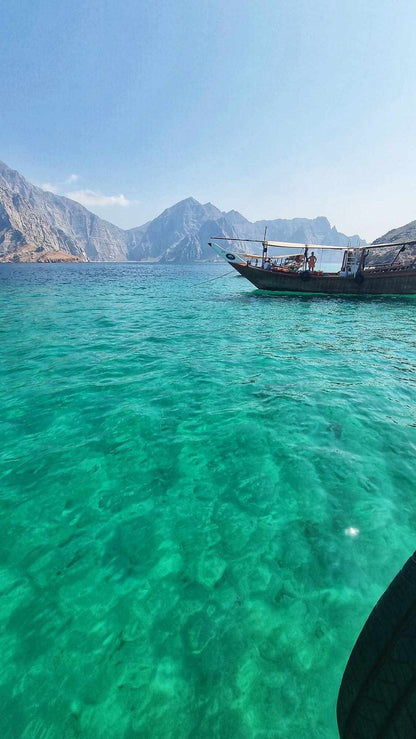 From Khasab: Overnight Dhow Cruise with Dolphin Watching and Snorkeling