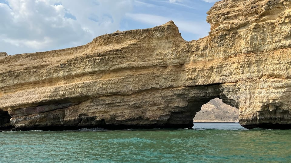 Muscat: Dolphin Watching and Snorkeling Boat Trip