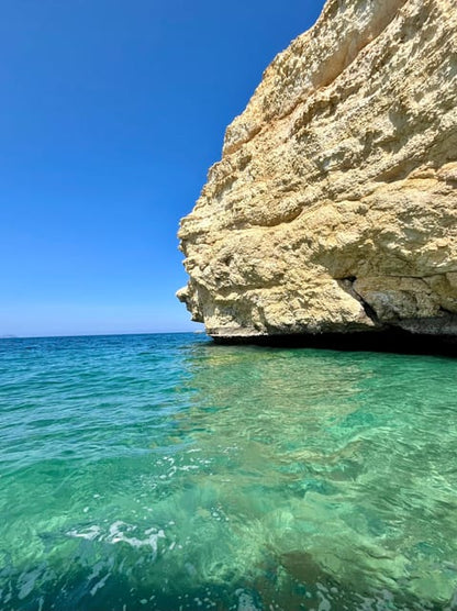 Muscat: Dolphin Watching and Snorkeling Boat Trip