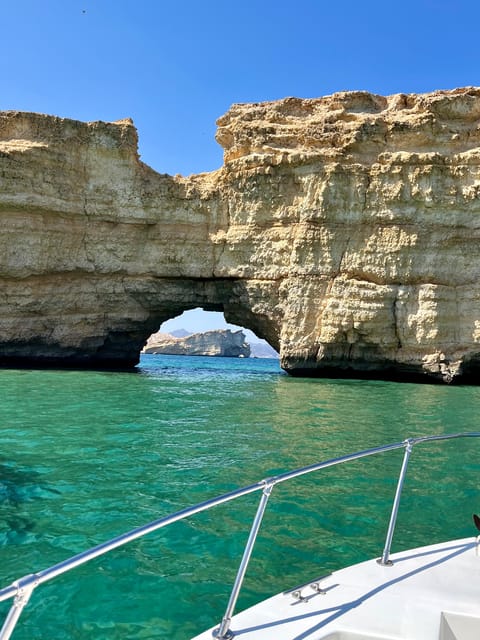 Muscat: Dolphin Watching and Snorkeling Boat Trip