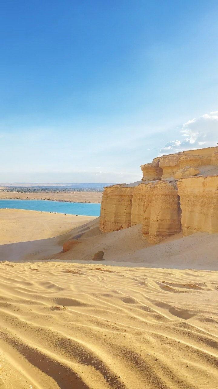 White limestone towers and dunes in Agabat Valley