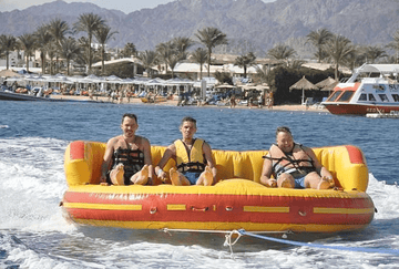 Sharm El - Sheikh: Half - Day Tour with Parasailing, Camel Ride, Scuba Dive and Quad Bike