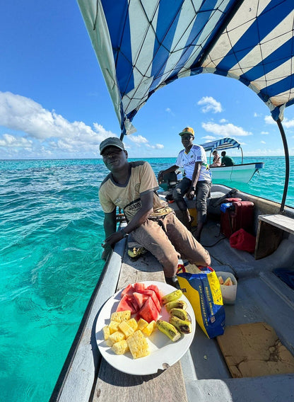 Zanzibar: Full Day Tour to Mnemba Island, Jozani Forest, Kuza Cave, Paje Beach and The Rock