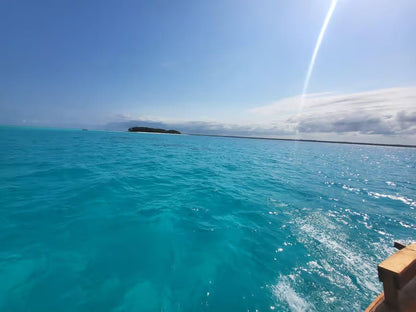 Zanzibar: Mnemba Island Boat Tour with Snorkeling and Optional Lunch