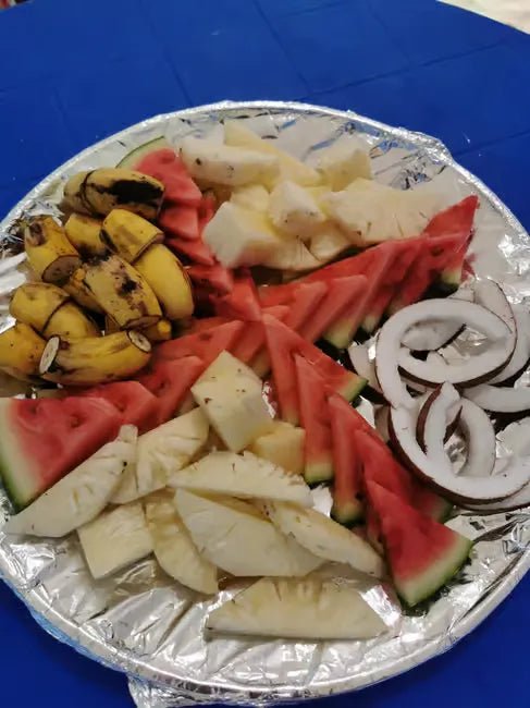 Zanzibar: Mnemba Island Dolphin Watching and Snorkeling Tour with Seafood Lunch