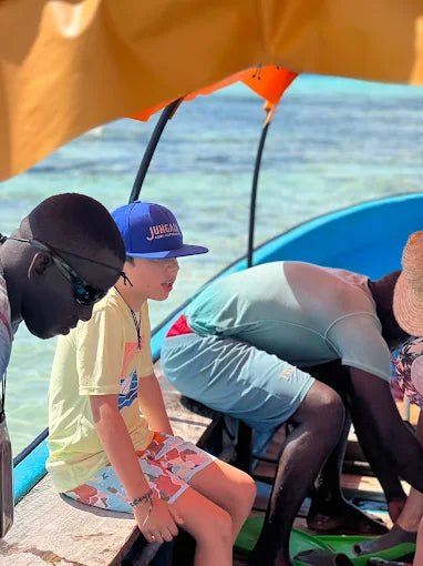 Zanzibar: Mnemba Island Dolphin Watching and Snorkeling Tour with Seafood Lunch