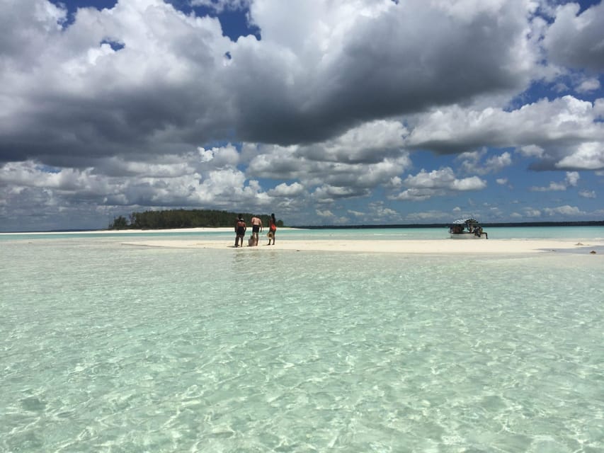 Zanzibar: Mnemba Island Snorkeling and Dolphin Watching Tour by Dhow Boat