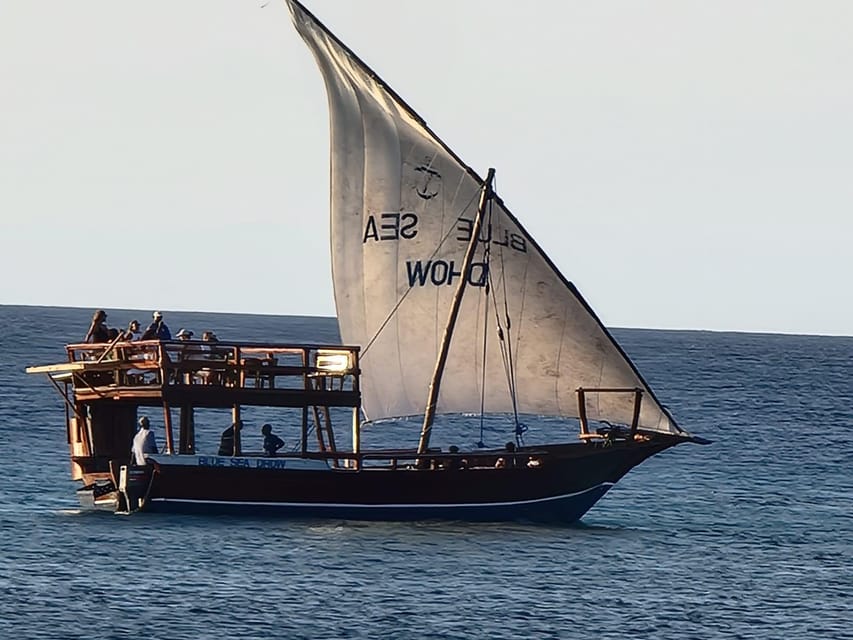 Zanzibar: Mnemba Island Snorkeling and Dolphin Watching Tour by Dhow Boat