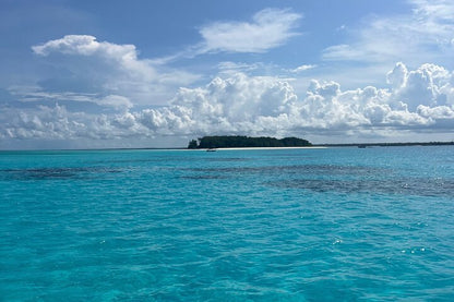 Zanzibar: Private Mnemba Island Snorkeling Tour with Hotel Pickup