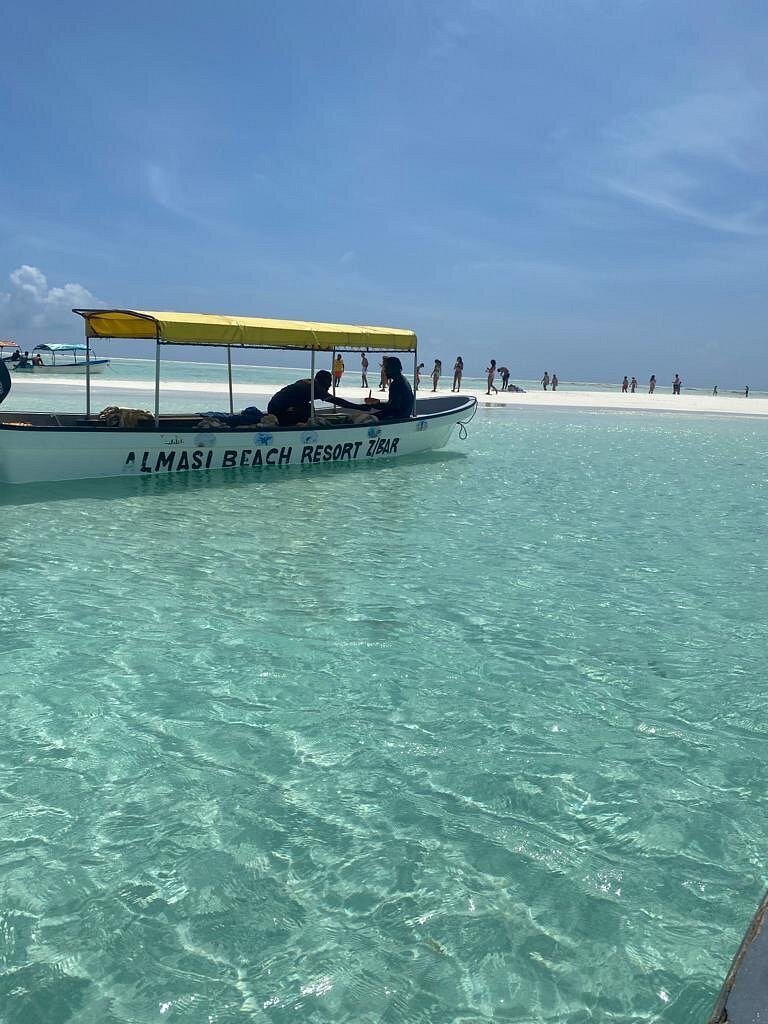 Zanzibar: Private Mnemba Island Snorkeling Tour with Hotel Pickup