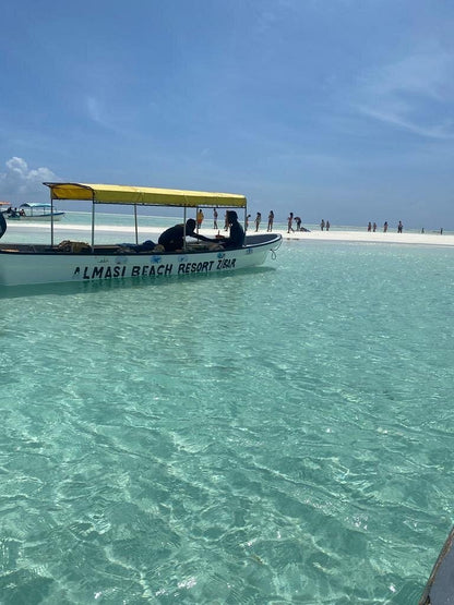Zanzibar: Private Mnemba Island Snorkeling Tour with Hotel Pickup