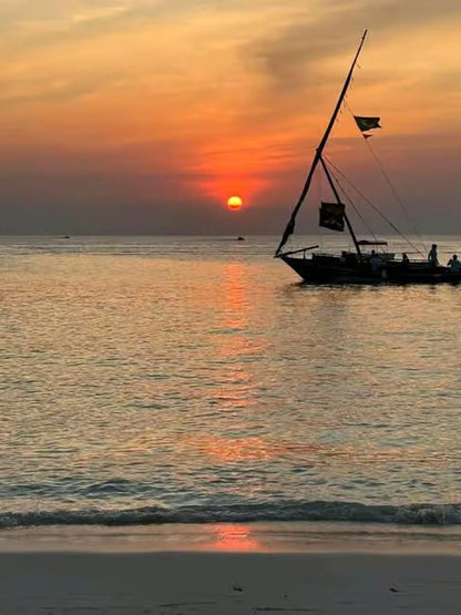 Zanzibar: Sunset Dhow Cruise at Nungwi Beach with Snacks