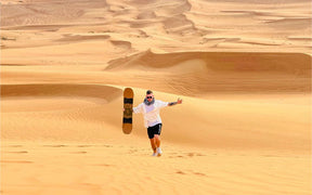 Dubai: Sandboarden, Kameelrit en Rode Duinen Safari