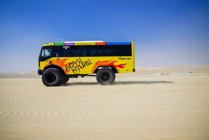 Doha : visite en bus monstre dans le désert de Sealine